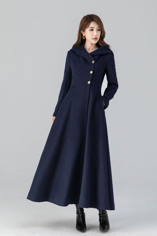 Woman wearing handmade vintage wool blend hooded coat in winter