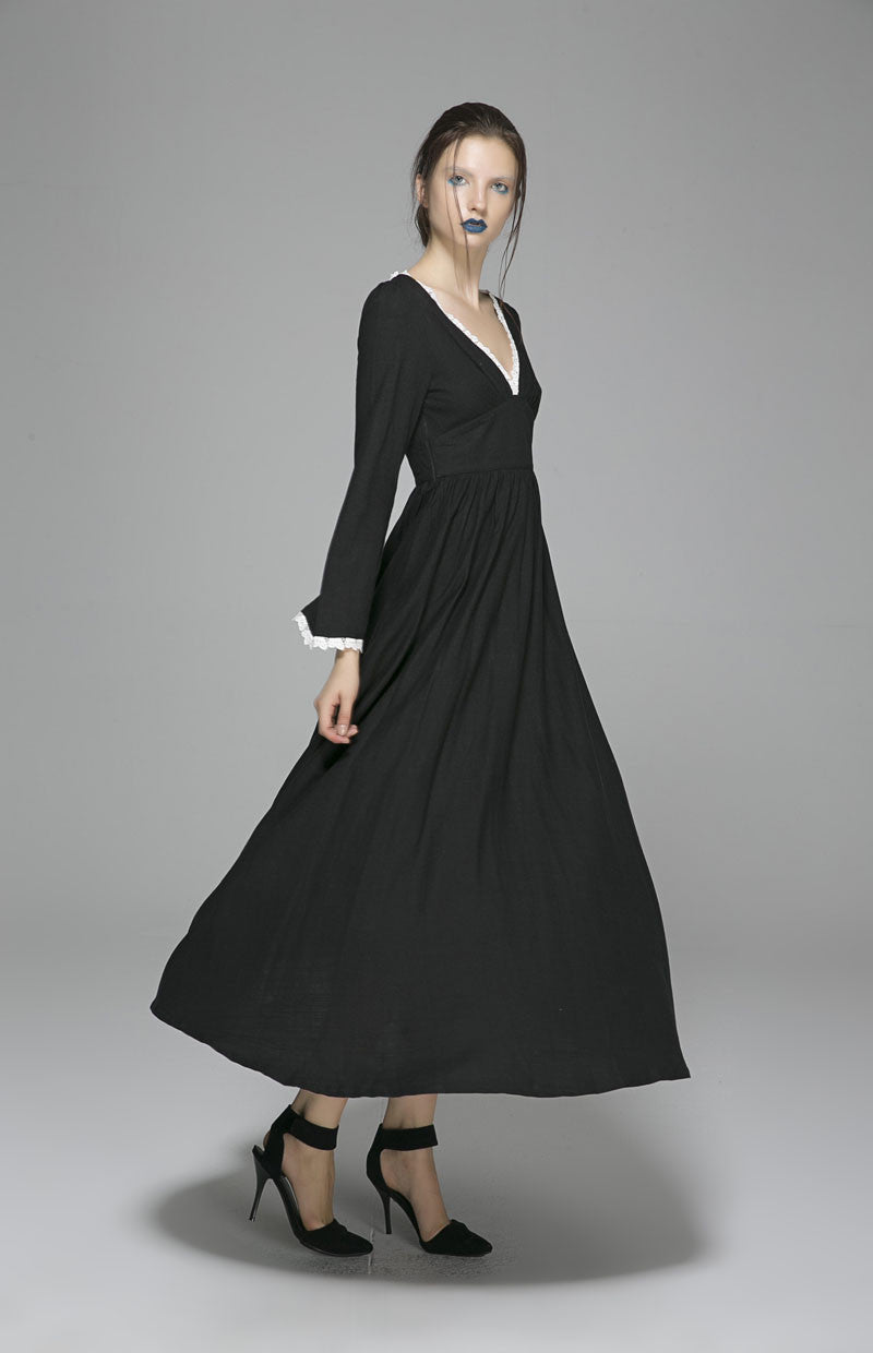 Black Linen Blend Maxi Dress with Deep V Neckline and Pleated Skirt Black Linen Blend Maxi Dress with Deep V Neckline and Pleated Skirt