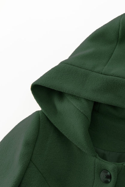 Green hooded garment on a white background