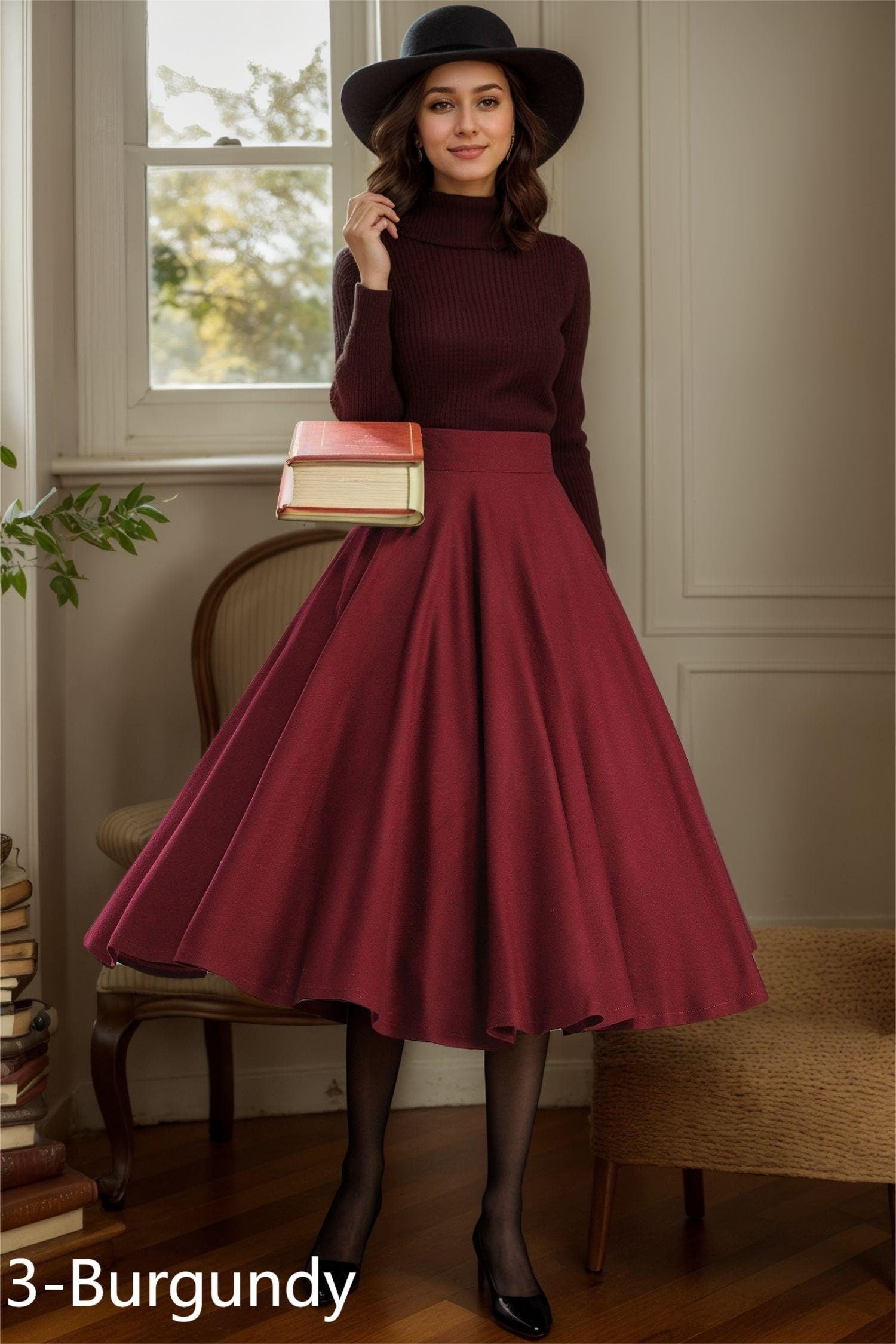 May include: A burgundy midi skirt with a high waist and a full circle shape. The skirt is made of a soft, flowing fabric and has a simple design.
