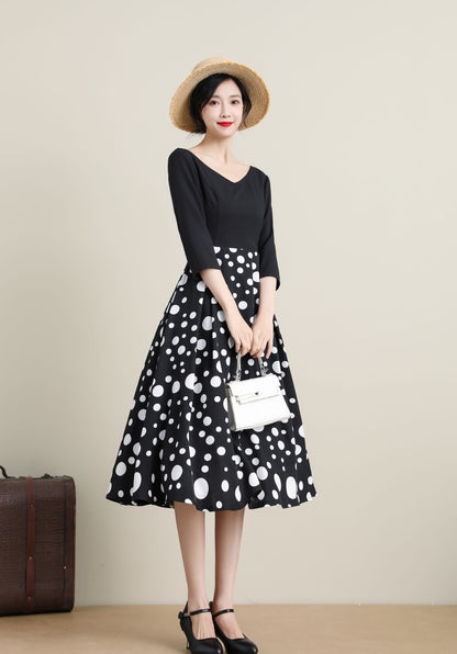 Vintage-Inspired Black Dress with Polka Dot Skirt 3317
