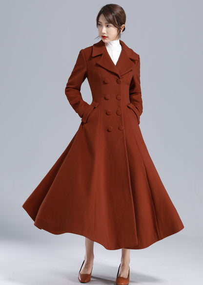 Woman wearing a brown coat on a gray background