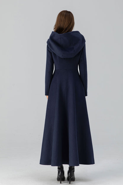 Model showcasing below-knee length vintage hooded overcoat by Xiaolizi