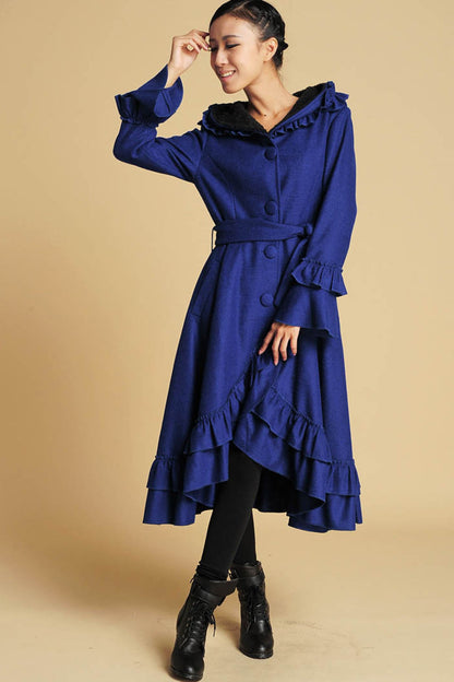 Women’s vintage royal blue wool coat with dramatic hood and maxi length design