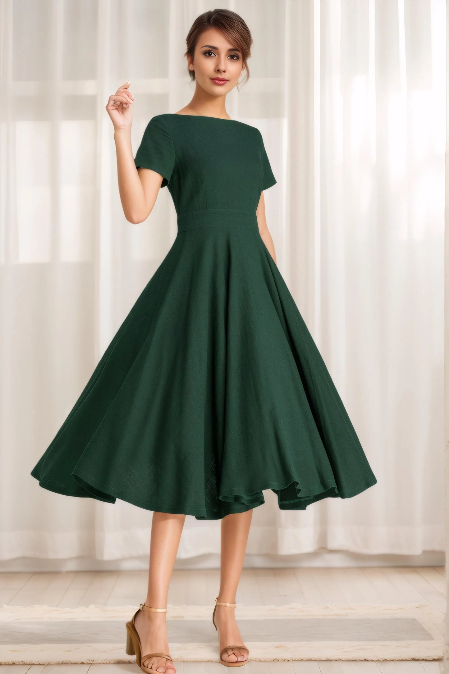 May include: A dark green midi dress with a boat neck and short sleeves. The dress has a fitted bodice and a full skirt.