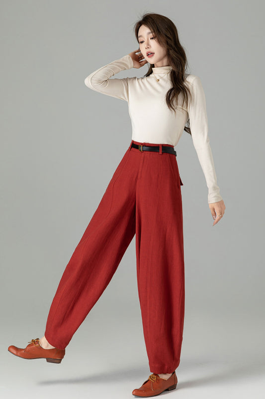 May include: Red wide-leg pants with a black belt.