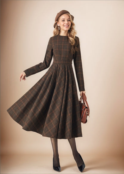 Woman wearing a brown plaid dress with a matching beret and handbag on a beige background