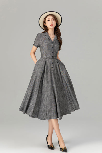 Asian model wearing gray linen shirt dress with belt and swing skirt