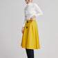 Yellow knee length pleated coat for women with high waist 2260