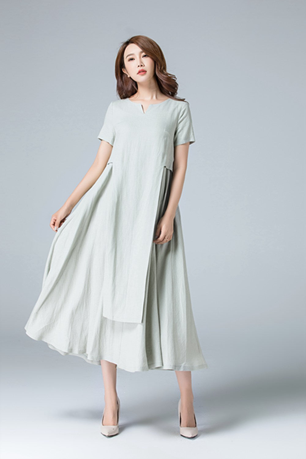 Plain linen dress with irregular folds 1787