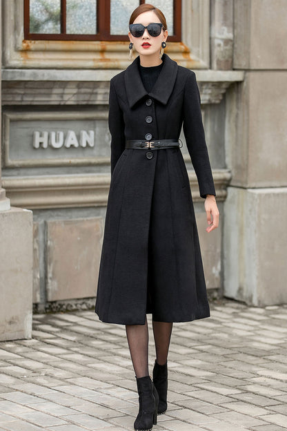Elegant black winter overcoat styled with belt loops and long sleeves
