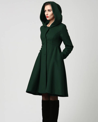 Model wearing handmade wool blend hooded coat with button front